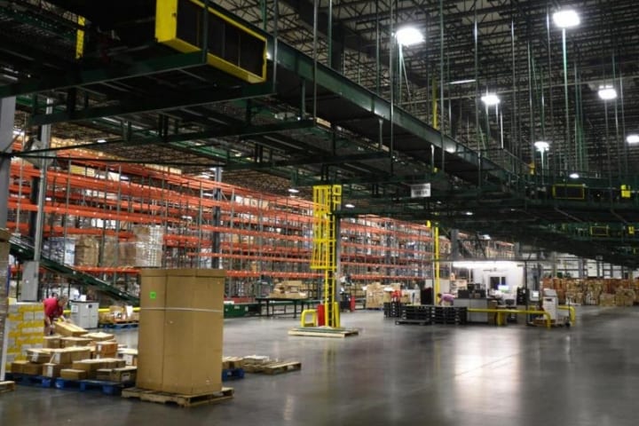 Warehouse with orange scaffolding and boxes