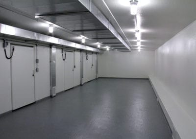 Portable warehousing with white walls and grey flooring